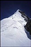 Climbers approaching the false summit of Broad Peak