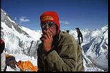 Mario Panzeri lights one up at Camp 3 after reaching the summit of Gasherbrum II